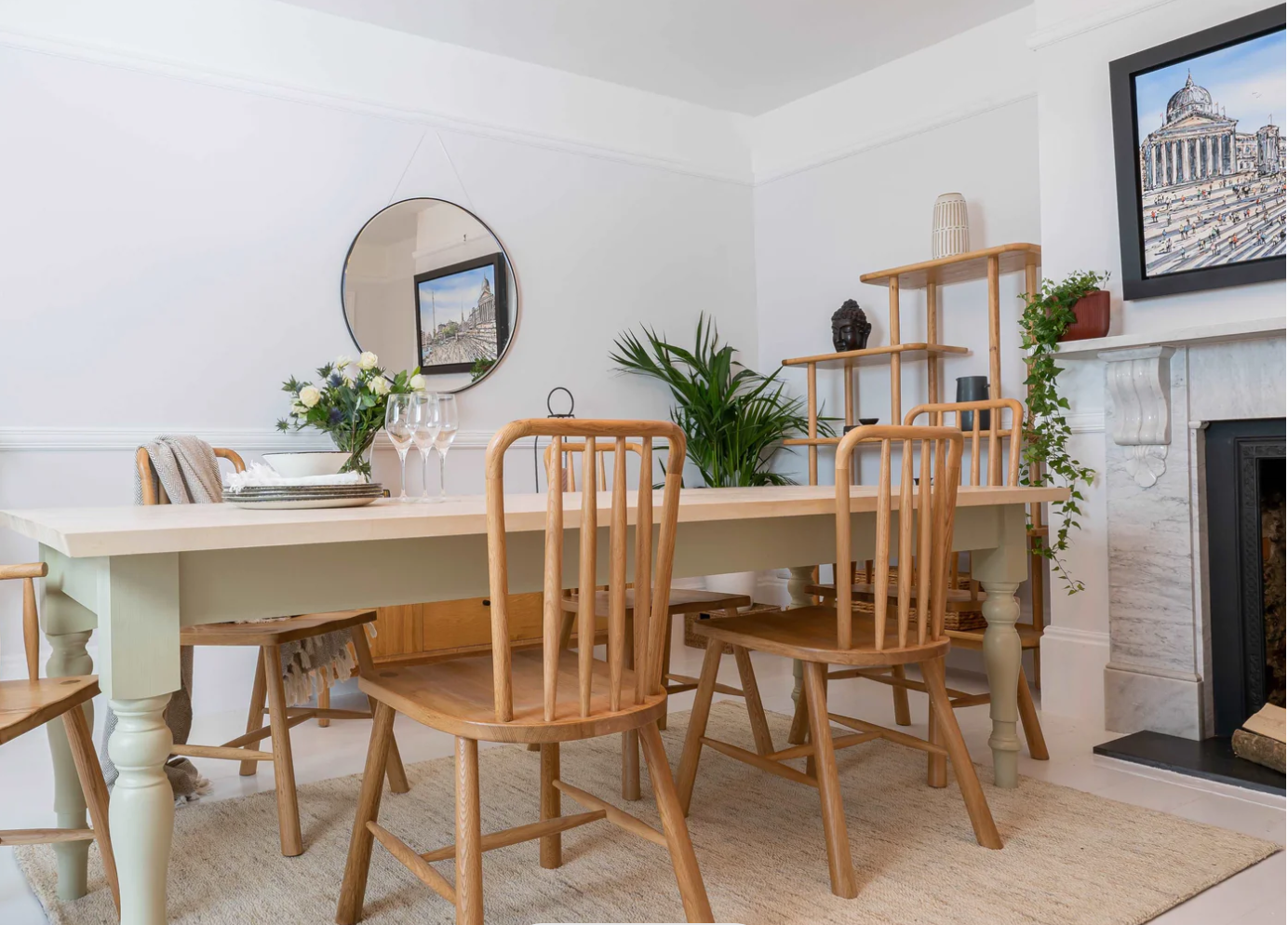 Farmhouse bespoke wooden dining table in sage green.